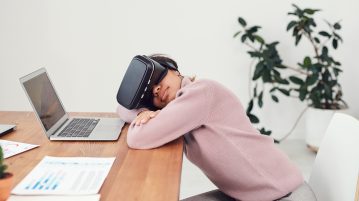 woman using virtual reality glasses