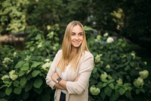 International Business alumna Ekaterina standing in a park