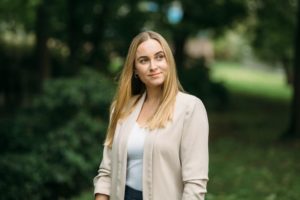 International Business alumna standing in the park